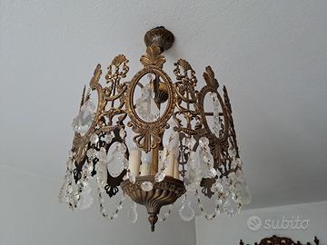 lampadario e applique in ottone con cristalli 