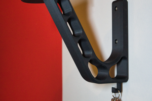 Porta casco moto da muro stampato in 3D – design m