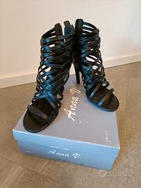 Sandali neri stile schiava con tacco alto