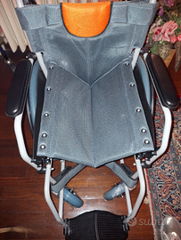 Sedia a rotelle pieghevole