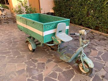 Motorino con cassone posteriore