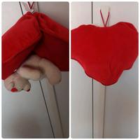 cuore che nasconde orsetto e dice I Love you