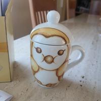 Mug con coperchio Thun