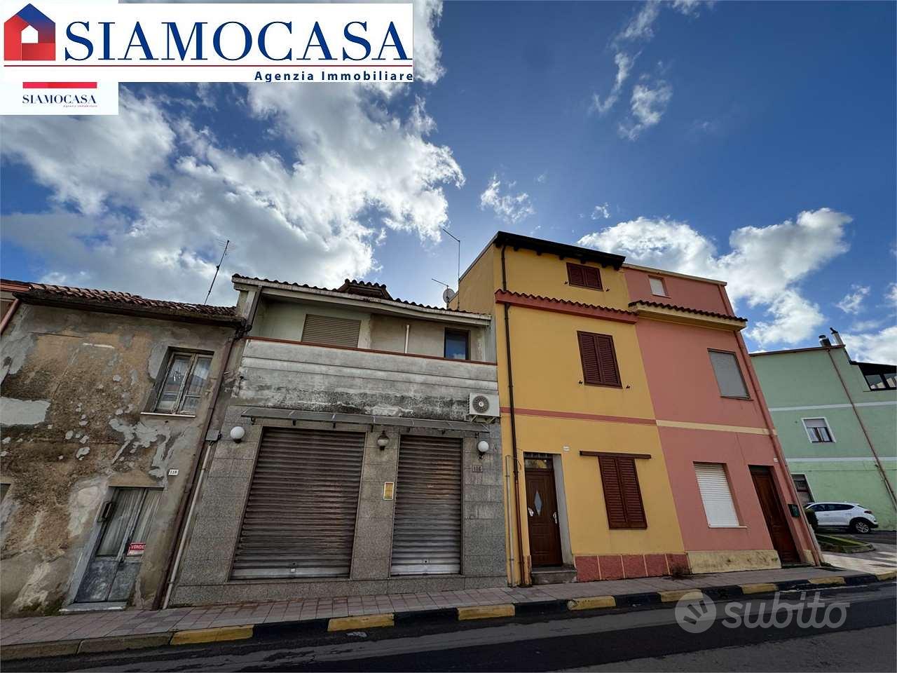 Casa con appartamento, locale commerciale e garage - Vista 3