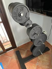 Rastrelliera + Pesi disco + Bilancieri.  Domyos