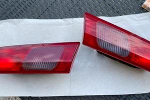 Luci posteriori alfa 156