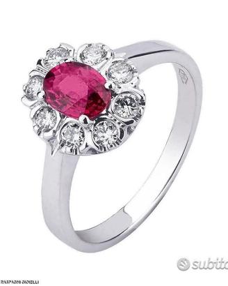 ANELLO ORO 18kt. CON DIAMANTI E RUBINO OVALE