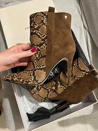 Trinchetto scamosciato e pelle