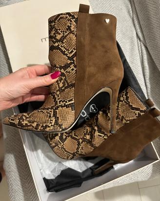 Trinchetto scamosciato e pelle