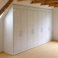 Armadio mansarda da falegname sotto tetto