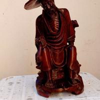 Statua fumatore di oppio