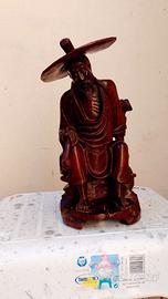 Statua fumatore di oppio