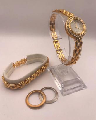 Orologio dorato con bracciale