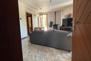 Casa a schiera cielo-terra con giardino
