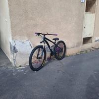 rockrider st 120 nera e viola modificata