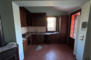 Porzione di casa con scoperto