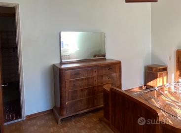 Cassettiera Art Déco con facciata in mogano