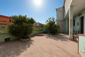 Appartamento al piano terra con cortile