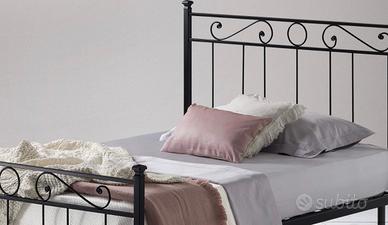 Letto ferro battuto in una piazza e mezzo