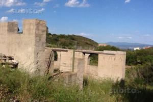 Terreno agricolo con costruzione agricola iniziata