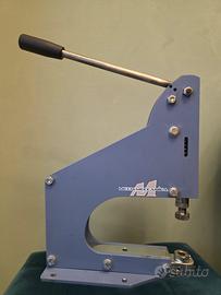 torchietto a leva frontale per bottoni e borchie