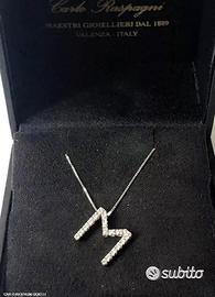 COLLANA LETTERA ORO 18kt. CON DIAMANTI NATURALI