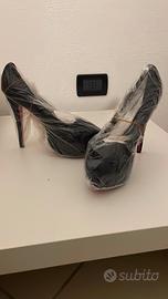 Décolleté Nere con Plateau e Suola Rossa taglia 44