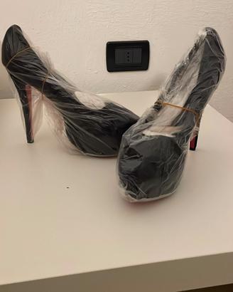 Décolleté Nere con Plateau e Suola Rossa taglia 44