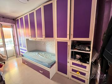 ARMADIO A PONTE CON LETTO