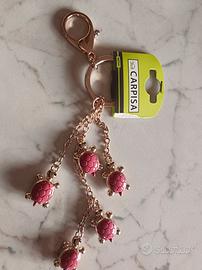 Portachiavi Carpisa con ciondoli tartaruga rosa