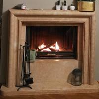 CORNICE CAMINO IN TRAVERTINO ROSA PERLINO