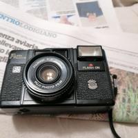 Macchina fotografica flash fuji a fujinon1:4 f38