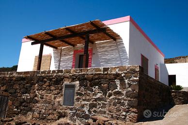 Dammuso vista panoramica mare e tramonto