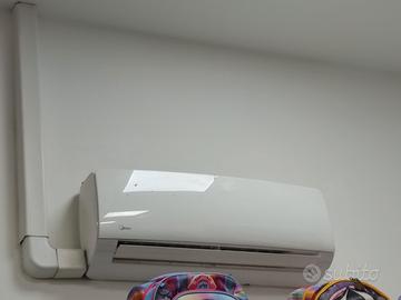 3 climatizzatori midea con 3 unità esterne