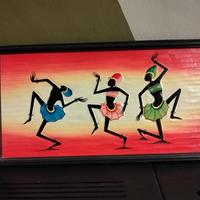 quadro decorativo con figure tribali in legno 