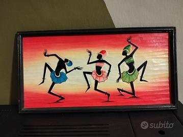 quadro decorativo con figure tribali in legno 