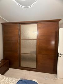 Camera da letto in legno noce