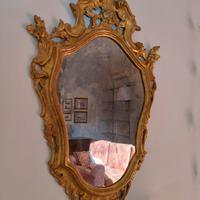 Specchio con cornice in oro zecchino