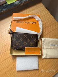 Mini pochette acessorizes Louis vuitton