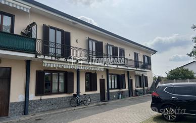 ROVELLASCA: LUMINOSO TRILOCALE IN ZONA RISERVATA
