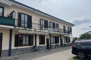 ROVELLASCA: LUMINOSO TRILOCALE IN ZONA RISERVATA
