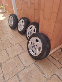  cerchi conpleto di gomme e volante per fiat 