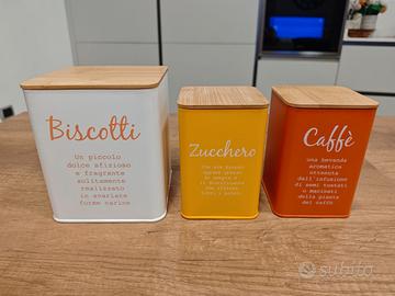Tris barattoli di latta biscotti/zucchero/caffè