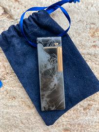 Accendino a pietrina con accensione laterale