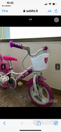 Bicicletta con rotelle  bambina