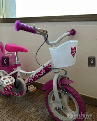 Bicicletta con rotelle  bambina