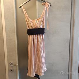 Elegante abito plissettato oro rosa