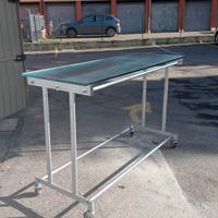 tavolo vetro 160Lx60x103h con ruote ex negozio 
