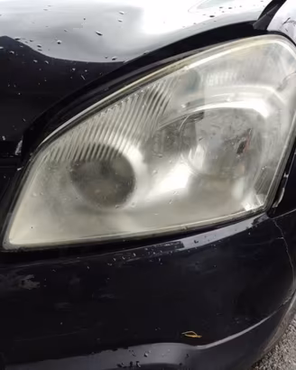 Proiettore sinistro NISSAN QASHQAI del 2010