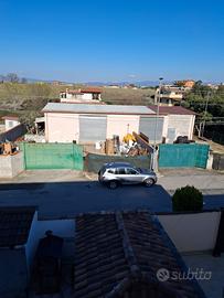 Terreno 1000mq con magazzino e appartamento